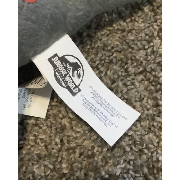 Jurassic World Dominion Carnotaurus Dinosaur Plush Toy 7” Stuffed Animal - Picture 2 of 6